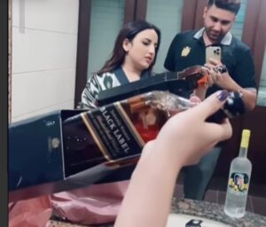 Hareem Shah & Husband unpacks liquor bottles